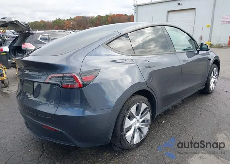 2023 Tesla Model Y Rwd из США, поврежденный, VIN 7SAYGDED6PF948385